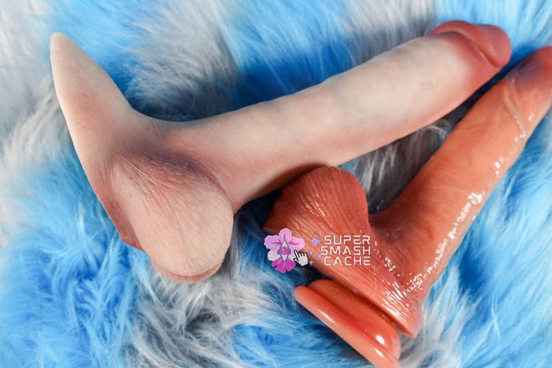 Ranking the Most Realistic & Sliding Skin Dildos: RealCock, Jock, Valm & More 15 Real Cock 2 Max by Abyss Creations next to Renaissance DaVinci silicone sliding skin dildo by Blush Novelties