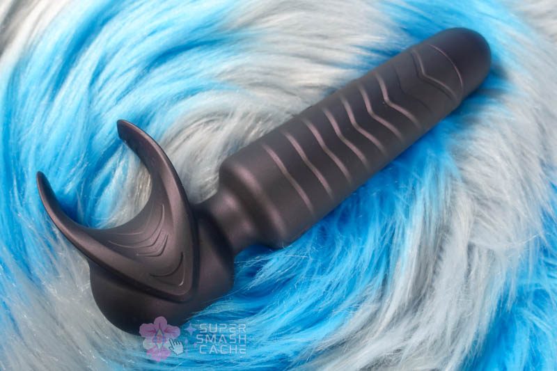 Man.wand Evo penis vibrator with flexible wings in navy blue silicone