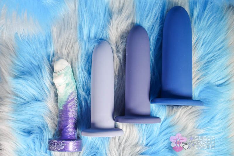 Size comparison of VWELL SuperFit XL dilators against average dildo size for scale reference 2
