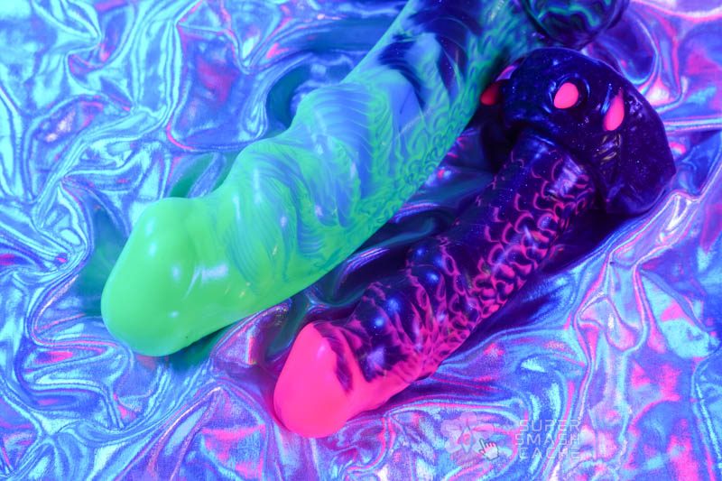 Uberrime BIG Damn Alien: Tiered G-Spot & Depth Dildo 3 Comparison photo of Big Damn Alien next to regular Damn Alien showing size difference