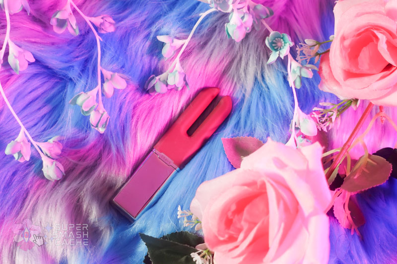 Compact Crave Duet vibrator showing steel base and flexible silicone-coated prongs