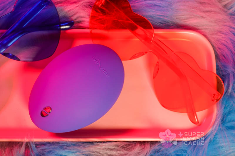 We-Vibe Temp rechargeable massager with blue matte silicone finish, top view, pebble-shaped design