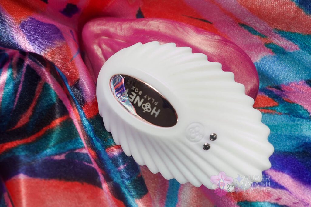 Gusset-facing side of white Honey Play Box Pearl 2 seashell-shaped clitoral panty vibrator