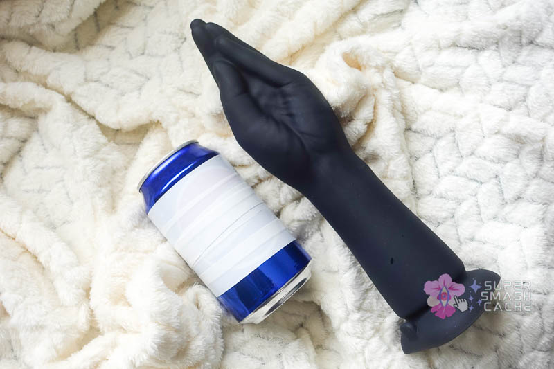 b-vibe 10.5" silicone fisting dildo vs. soda can size comparison