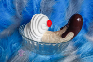 XR Brands Simply Sweet Chocolate Dipped Banana Split sundae dildo with whipped cream in glass bowl