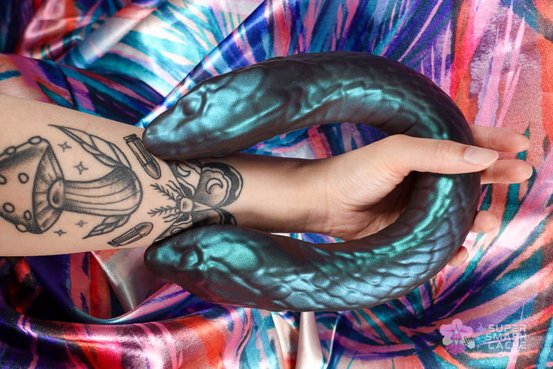 6 Silicone Double Dildos for Body-Safe DP (2026 Edition) 29 Temptasia Twin Python Silicone Fantasy Double Dildo with snake heads curved for hand size comparison