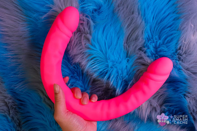 6 Silicone Double Dildos for Body-Safe DP (2026 Edition) 35 Hot pink Blush Rusé 18" Slim Silicone Double dildo resting curvature for partner play