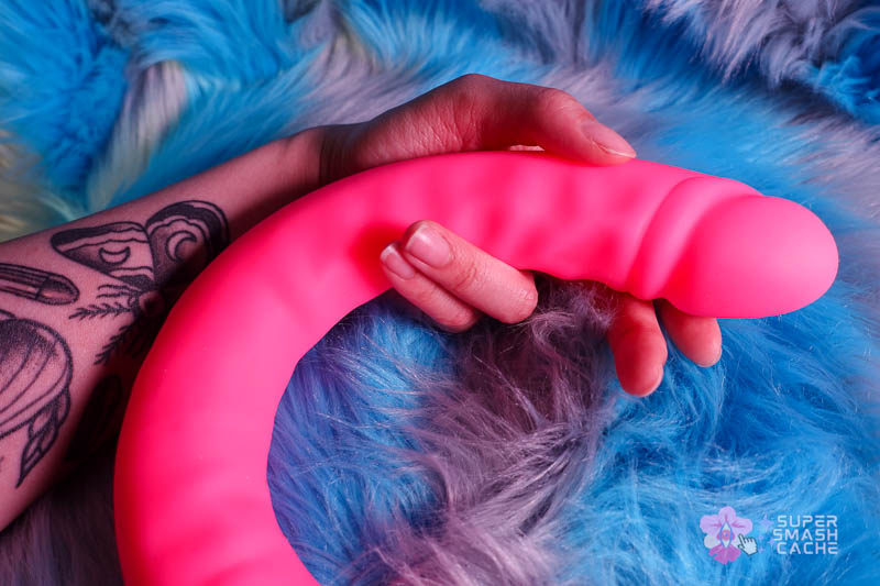 6 Silicone Double Dildos for Body-Safe DP (2026 Edition) 32 Hot pink Blush Rusé 18" Slim Silicone Double Dong wrist size comparison